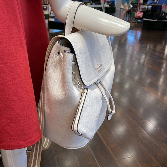 Kate Spade Rosie Medium Flap Backpack 
K8714 pebbled leather Parchment rosie
NWT - Picture 15 of 16